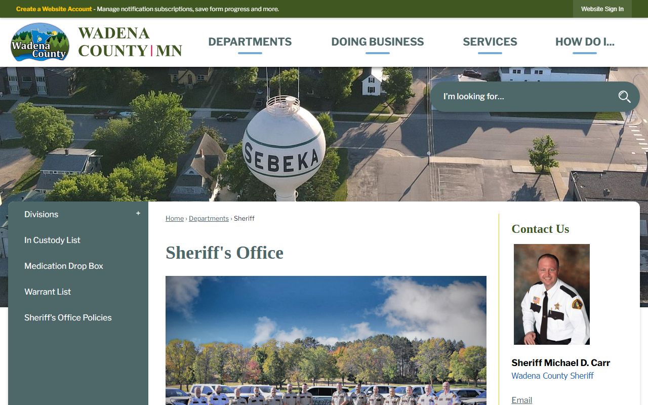 Wadena County Sheriff's Office website showing police blotter access, department divisions, and records request information